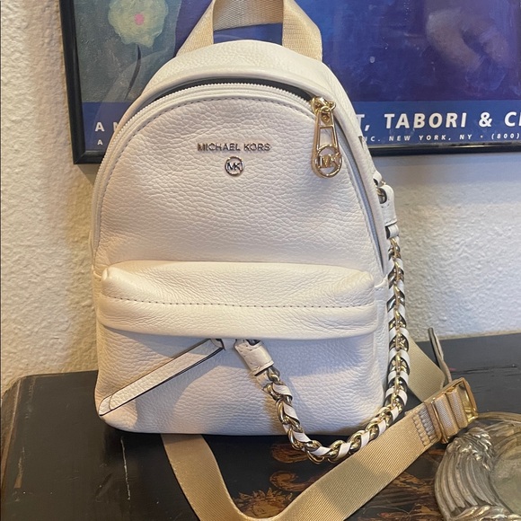 Michael Kors Handbags - MICHAEL KORS MINI Cream beautiful Leather Backpack with Chain Detail EUC!!